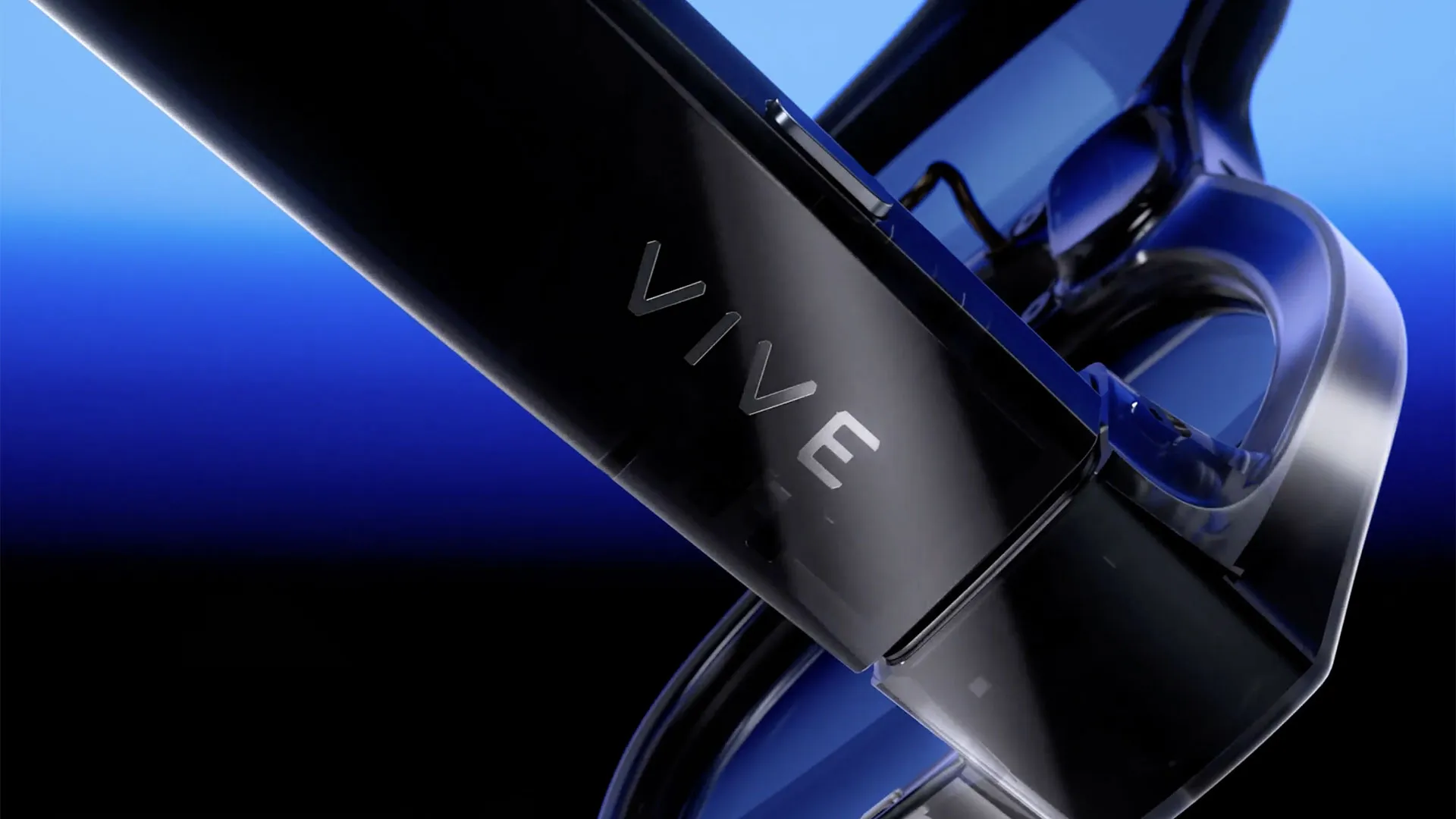Close-up of the VIVE Eagle hinge and temple, showing the engraved VIVE mark